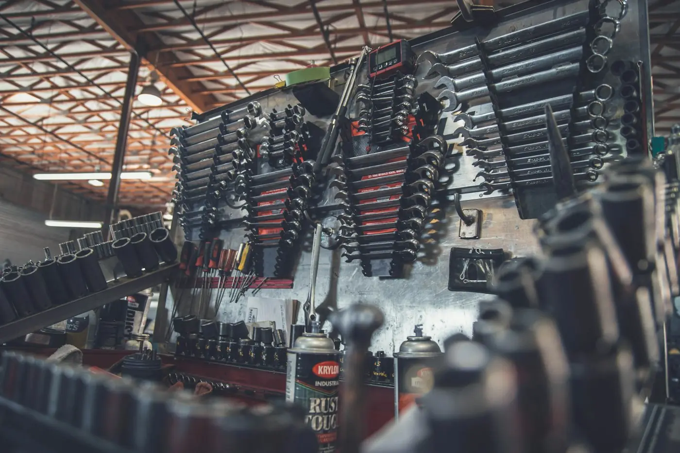 Wall of organized mechanic's tools in a workshop